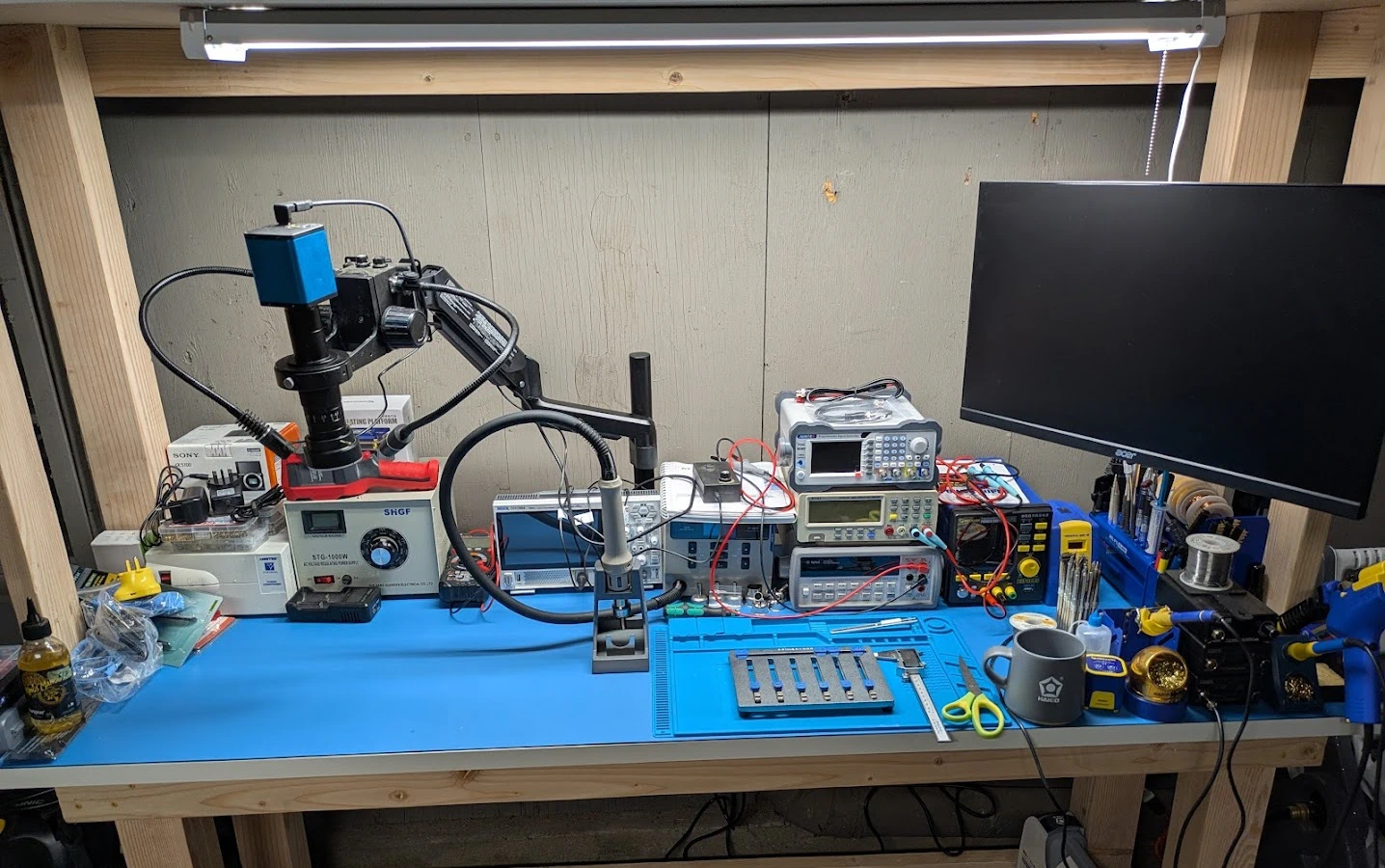 Electronics repair bench with tools